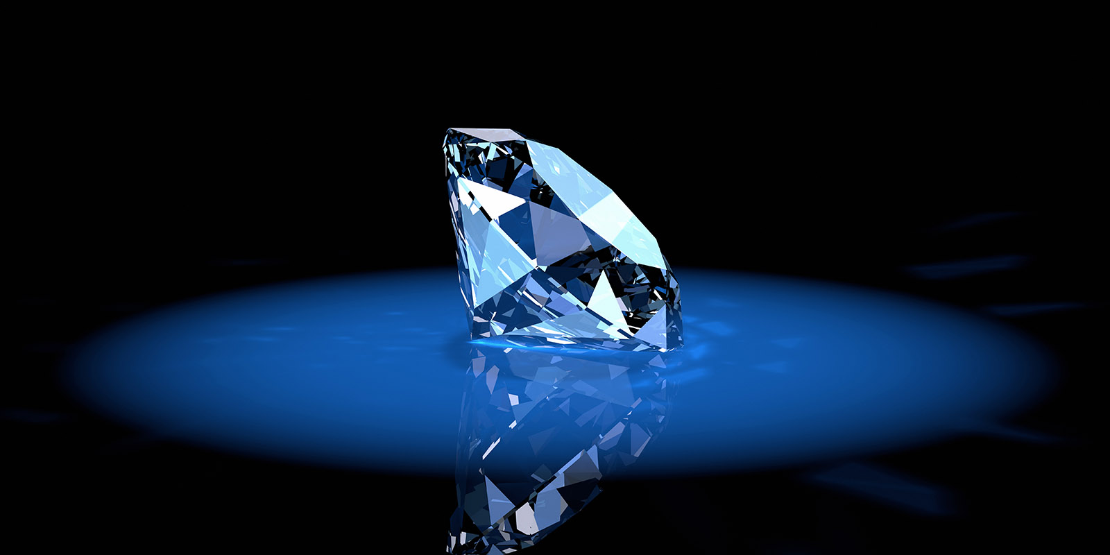 Shiny diamond gem in a blue spotlight