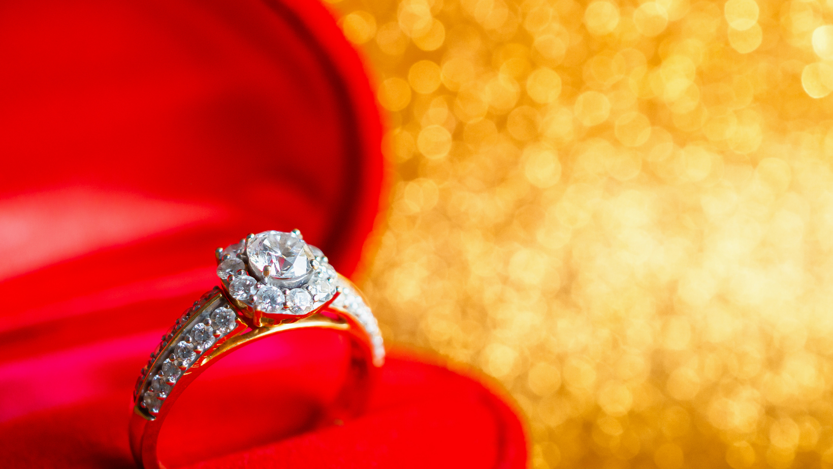 Silver and Diamond Ring on a red cloth
